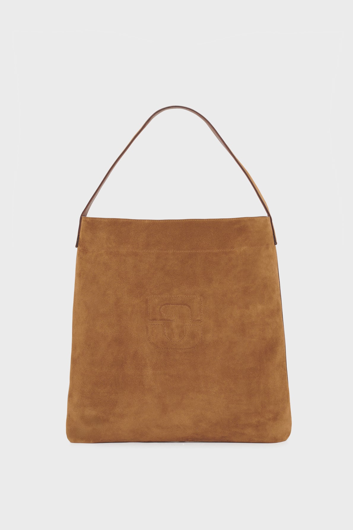 A brown cuir velours sac hobo handbag with a single leather shoulder strap and a subtle embossed logo on the front, set against a plain white background.