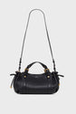 A black leather mini sac à main with gold hardware, crafted from luxurious cuir grainé, featuring a long adjustable shoulder strap, two short handles, and a bandoulière amovible, displayed against a plain white background.