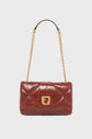 Brown quilted leather sac bandoulière in luxurious cuir, featuring a gold chain strap and gold rectangular clasp, displayed against a plain white background.