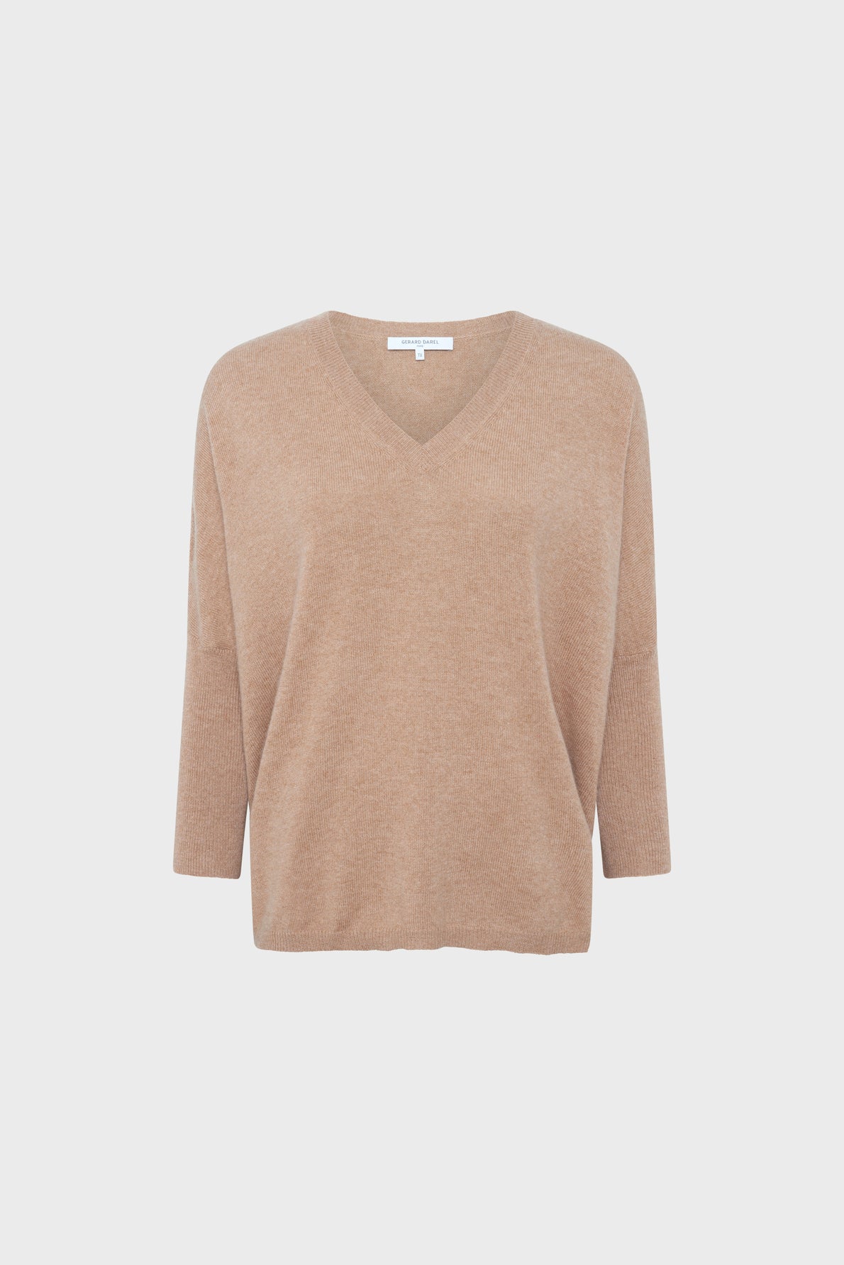 Light brown, long-sleeve, V-neck sweater with a relaxed fit displayed on a plain white background.