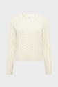 A cream-colored, long-sleeve, cable-knit pull écru with a round neckline and subtle motifs géométriques, displayed on a plain white background.