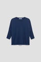 Navy blue, long-sleeve knit pull femme with a crew neckline, displayed on a light gray background. The sweater is crafted in cachemire and features a simple and relaxed coupe ample fit.
