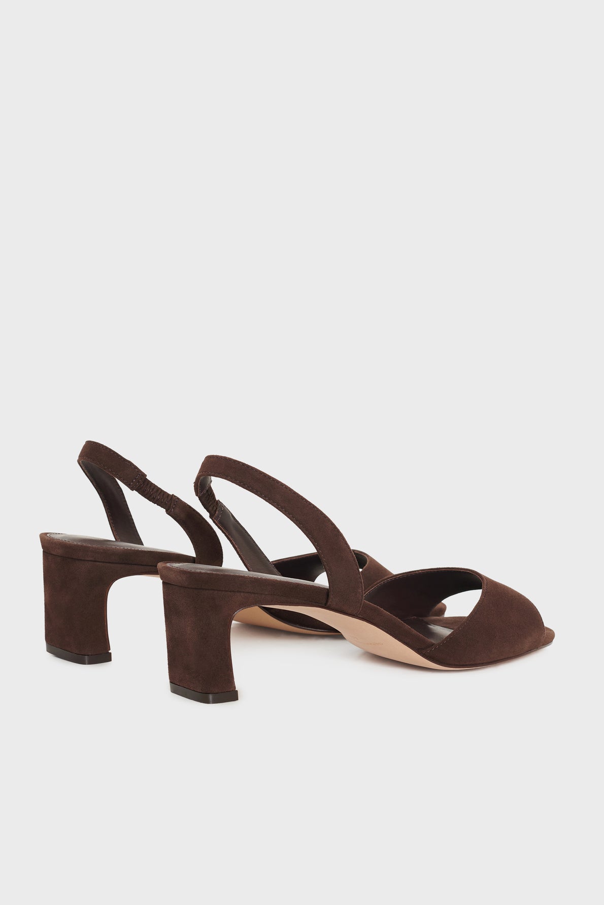 A pair of sandales cuir velours marron open-toe slingback heels with wide crisscross straps and block heels, displayed on a plain white background.