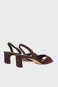 A pair of sandales cuir velours marron open-toe slingback heels with wide crisscross straps and block heels, displayed on a plain white background.