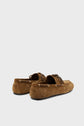 A pair of brown woven leather loafers with laces, reminiscent of classic chaussures bateau, viewed from the back at an angle and set against a plain light gray background—perfect for the printemps été season.