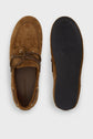 Brown textured chaussures bateau shown from above and below; one shoe displays the top with laces and stitching details in rich cuir velours, while the other showcases the black textured rubber sole, both set against a plain light background—perfect for printemps été style.