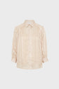 A beige, long-sleeve button-up blouse with a subtle vertical stripe pattern and a pointed collar, displayed on a plain white background.