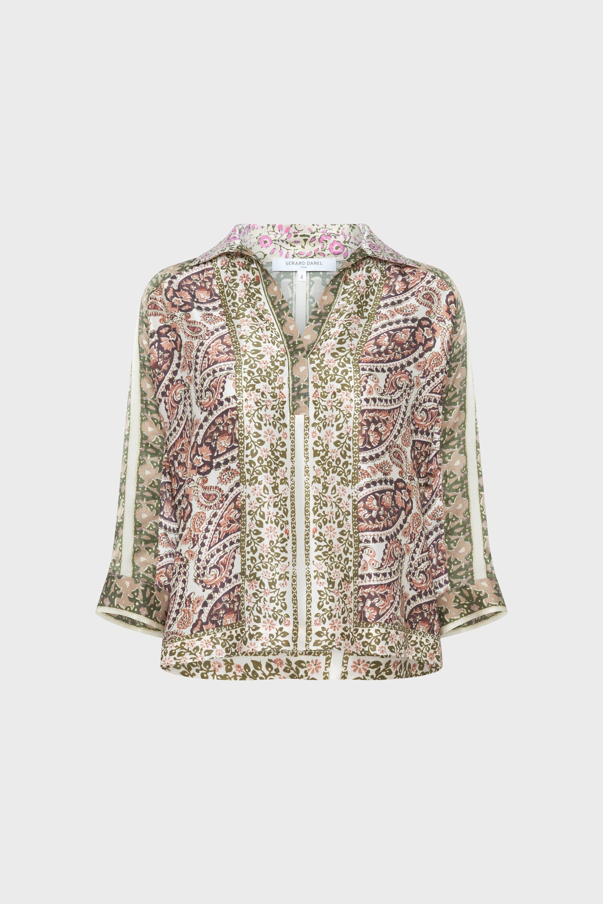 A paisley and floral-patterned blouse with a v-neckline, three-quarter sleeves, and a loose fit, featuring green, pink, and cream colors on a light background.