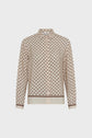 A beige, long-sleeve button-up blouse with a geometric circular pattern, a pointed collar, and brown accents on the cuffs and hem, displayed against a white background.