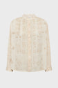 A long-sleeve cream blouse with a pale floral pattern, button-down front, and a mandarin collar, reminiscent of a delicate chemise fleurs brodées, displayed against a plain white background.