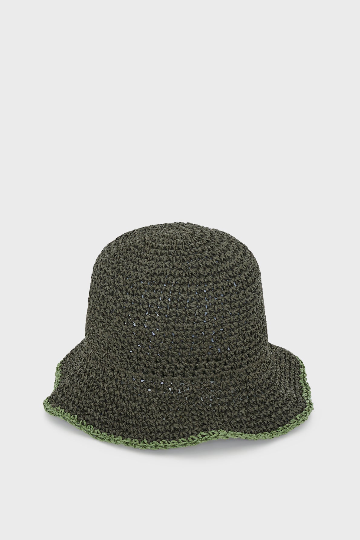 A dark green, crocheted bucket hat reminiscent of a classic chapeau kaki, with a wavy brim featuring a lighter green edging, displayed against a plain white background.