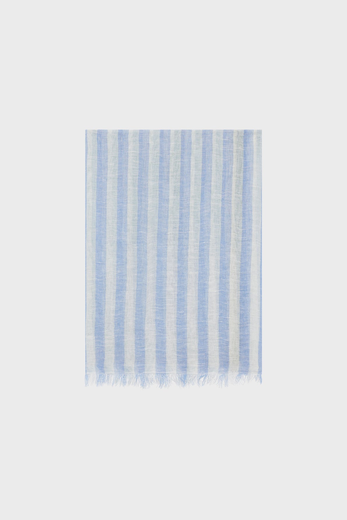A square scarf crafted from coton et lin, featuring vertical bleu ciel and white stripes in a classic étole rayée design, with short fringe along the bottom edge, displayed against a plain white background.