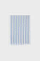 A square scarf crafted from coton et lin, featuring vertical bleu ciel and white stripes in a classic étole rayée design, with short fringe along the bottom edge, displayed against a plain white background.