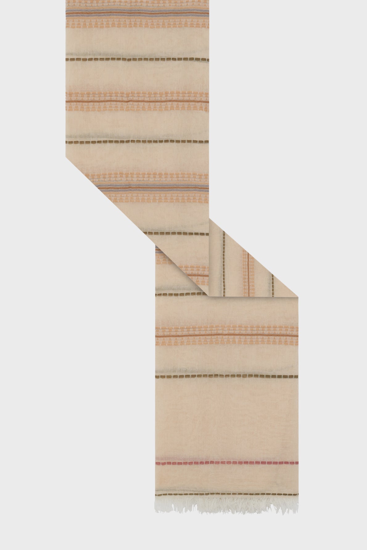 A beige woven textile with horizontal stripes in muted earth tones and small geometric patterns, shown folded with frayed edges at the bottom—perfect as an étole rayée for adding understated bohemian charm to your look.