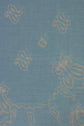 Blue cotton fabric with a subtle woven texture, featuring a light beige floral and paisley pattern. The design combines decorative, flowing lines and various abstract shapes with a gentle motif géométrique scattered across the surface, reminiscent of a classic carré bandana.