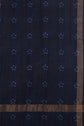 Dark fabric blending coton et soie, featuring small blue geometric patterns evenly spaced, and thin gold stripes running vertically and horizontally along the edge.