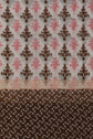 Close-up of fabric with a repeating pattern of brown and pink floral motifs on a white background, above a section with dense motifs géométriques in brown and white, reminiscent of the classic foulard Dalma style. Crafted from a luxurious blend of coton et soie, the fabric offers both elegance and softness.