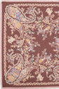 A brown fabric scarf featuring an intricate motif floral paisley and floral patterns in cream, yellow, blue, and lilac tones, bordered by small flowers and finished with a delicate fringe along the edges.