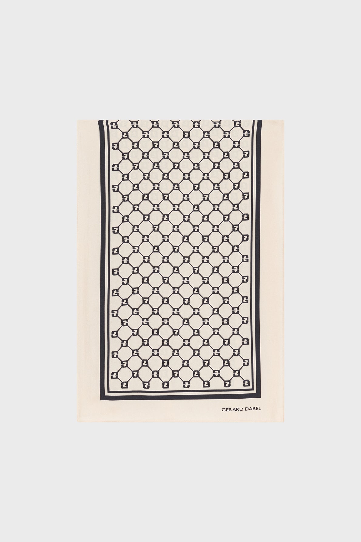 A beige rectangular foulard soie with a repeating black geometric pattern bordered by double black lines. The monogramme GD and the words GRAND DANEL appear in the bottom right corner, marking this as an édition limitée piece.