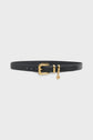 A black leather ceinture Gérard Darel with a gold buckle and a small round gold charm hanging from the buckle, displayed on a plain white background—an undeniably élégante ceinture femme for any sophisticated wardrobe.