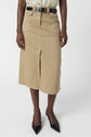 A person wearing a beige knee-length skirt with a front slit, black belt, light shirt tucked in, and black pointed shoes, standing against a plain white background.