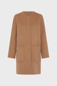 Camel-colored, knee-length wool coat with long sleeves, two large front pockets, a round neckline, and snap button closures. The coat is displayed against a plain white background.