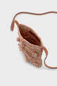 A small, woven raphia straw crossbody bag with a long brown cuir strap and textured floral details, shown from above with its open top revealing the empty interior—perfect as a chic porte-téléphone for everyday outings.