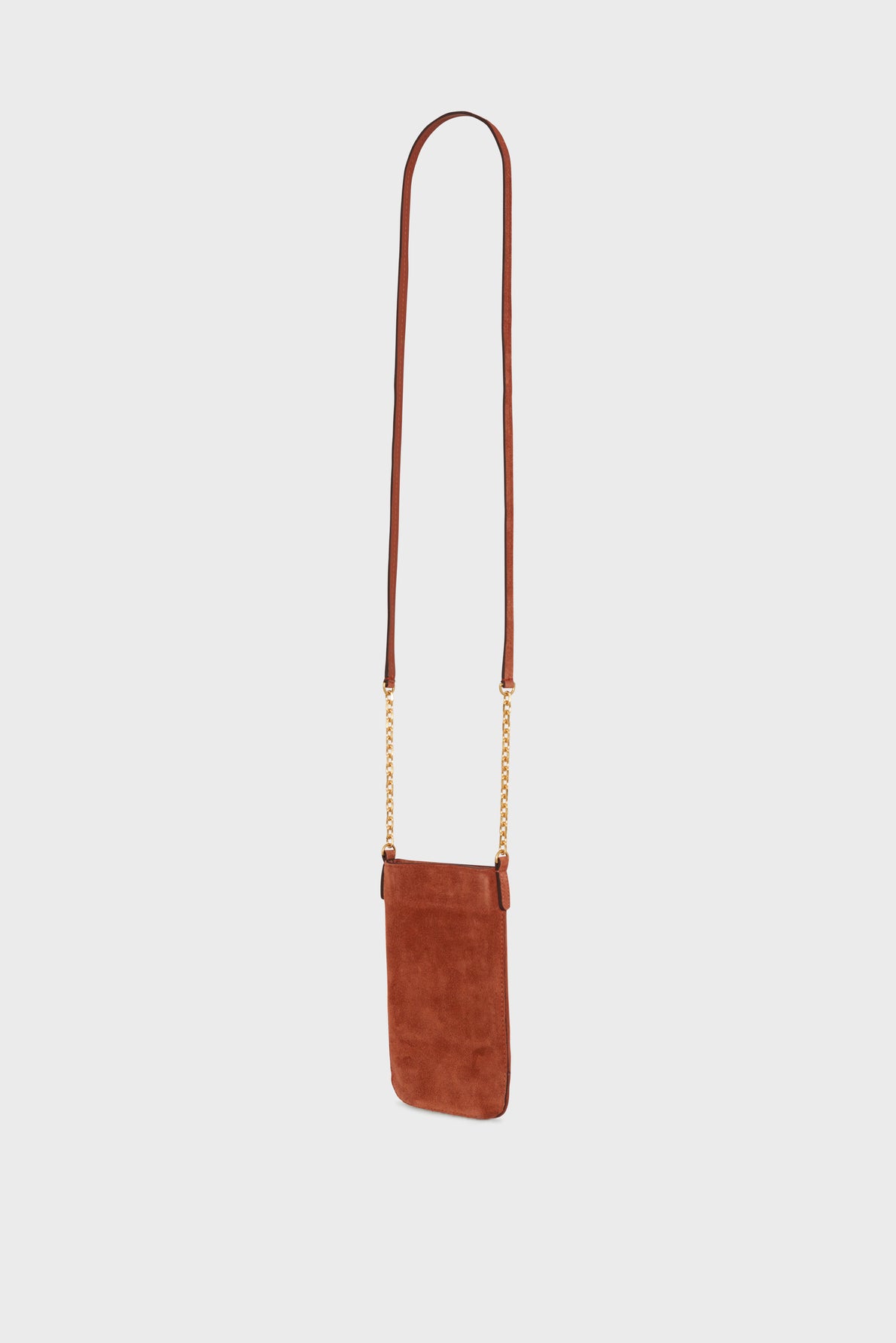 Brown cuir velours crossbody bag with a long leather strap and small, elegant bandoulière chaîne accents connecting the strap to the rectangular bag, displayed on a plain white background.