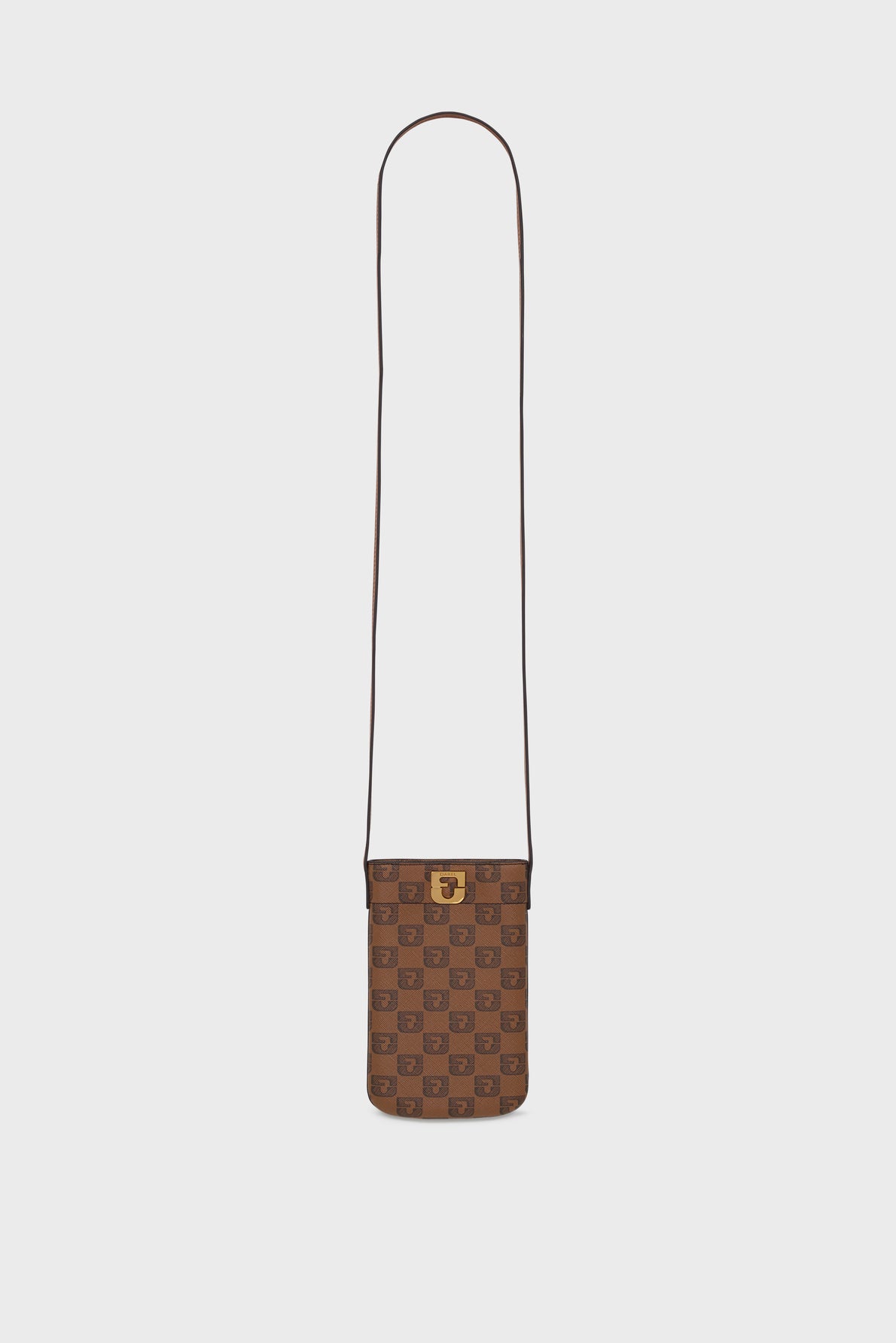 Brown crossbody bag with a checkered toile enduite monogrammée pattern, long thin strap, and a gold-tone fermeture magnétique clasp on the front. The porte-téléphone bag is displayed against a plain white background.