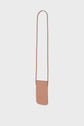 A small, rectangular, light brown leather crossbody bag crafted from cuir de vachette with a long thin strap, perfect as an accessoire tendance for carrying your essentials, is shown against a plain white background.