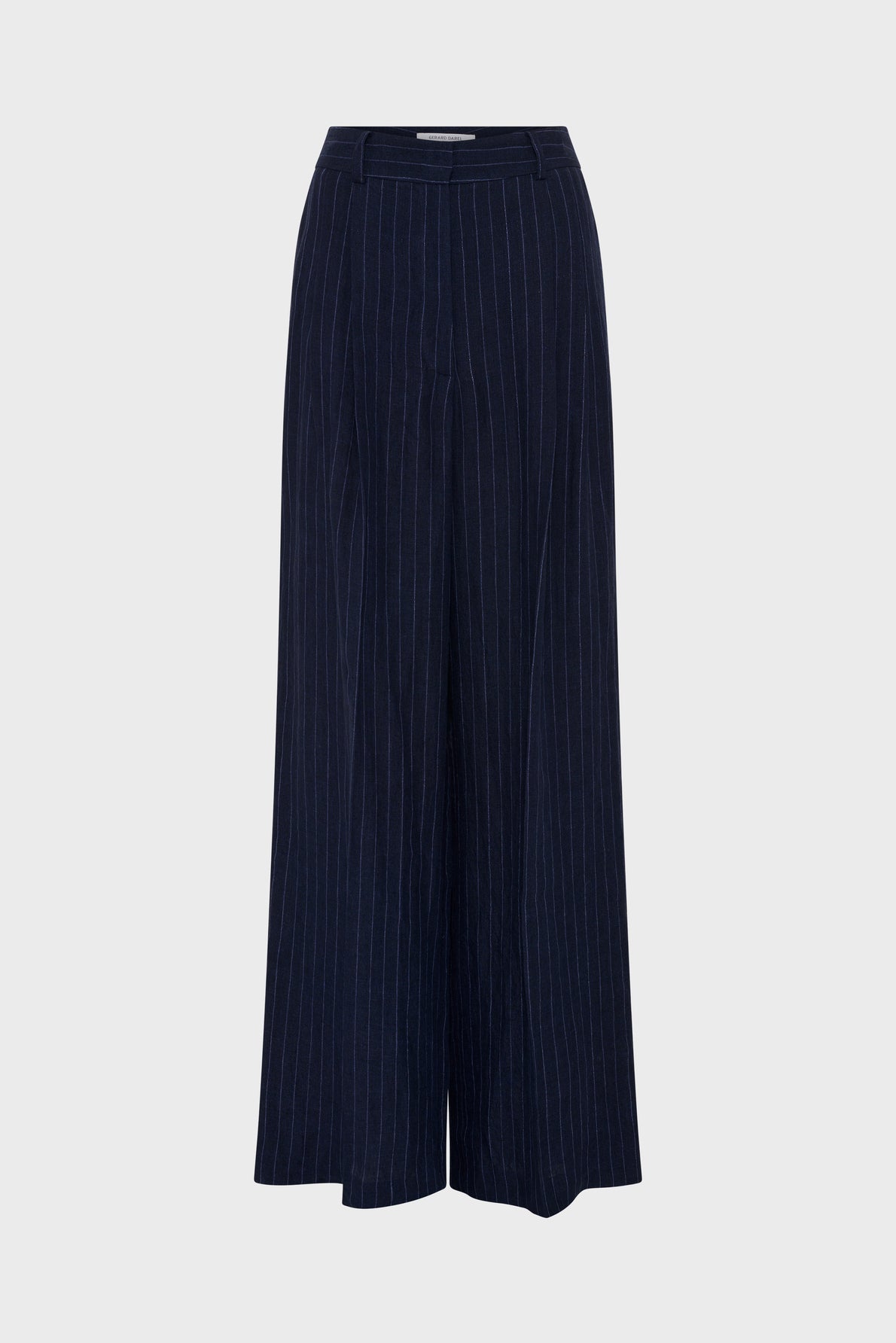 Wide-leg navy blue pantalon rayé with thin white vertical pinstripes, coupe large, taille haute, and a relaxed fit, displayed on a plain light gray background.