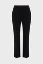 Black, straight-leg dress pants with a fitted waist and no visible buttons or embellishments, these pantalon noir chic offer a timeless silhouette perfect for any occasion. Displayed against a plain white background, they are an essential pantalon tailleur femme for every modern wardrobe.