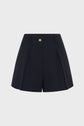 High-waisted, navy blue tailored shorts with front pleats, belt loops, side pockets, and a gold button closure, displayed on a plain white background.