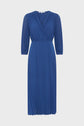 Knee-length blue dress with long sleeves, a V-neck wrap front, and pleated fabric throughout. The dress has a fitted waist and a flowy skirt.