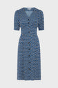 Blue robe mi-longue with short sleeves and an all-over white imprimé graphique, button-down front, and fitted waist, displayed on a plain white background.