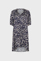 Short-sleeve robe courte in twill de viscose, featuring a navy, white, and beige animal print pattern with a v-neckline and a slightly longer back hem, displayed on a light background.