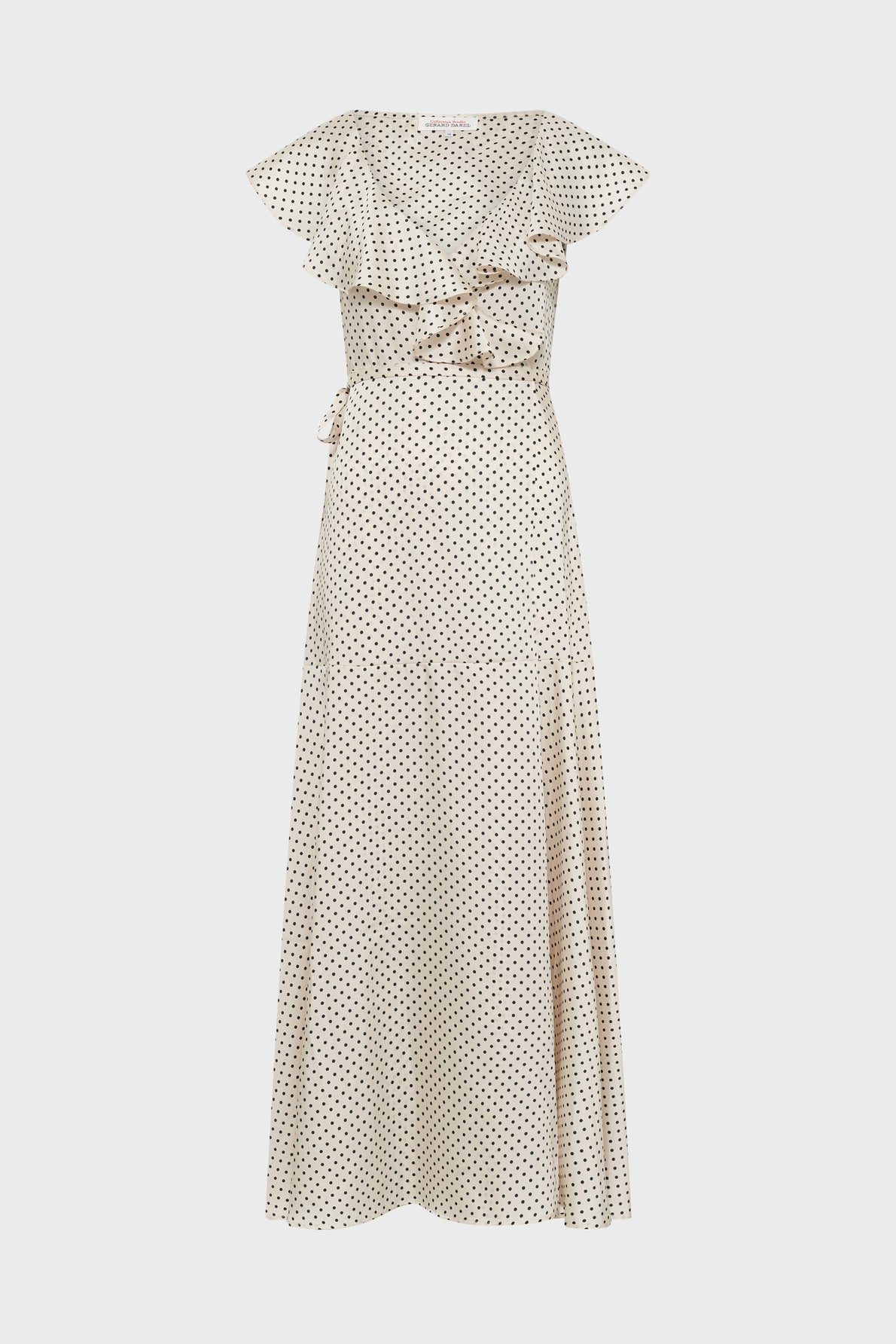 Cream-colored, short-sleeve, wrap maxi dress (robe longue portefeuille) with black motif à pois polka dots, a V-neckline, ruffle sleeves, tie waist, and a flowing skirt in a softly satinée finish. The dress is displayed on a plain white background.
