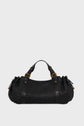 A black sac à main tressé in woven cuir d’agneau with gold hardware, two top handles, and ruched sides, set against a plain light gray background—a testament to savoir-faire artisanal.