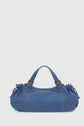 Blue denim sac à main with dual handles, rounded sides, and drawstring details on each end, inspired by the classic sac 24H silhouette, set against a plain white background.
