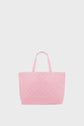 A large pink cabas monogrammé tote bag with two handles and a subtle repeating geometric pattern, displayed against a plain light gray background.