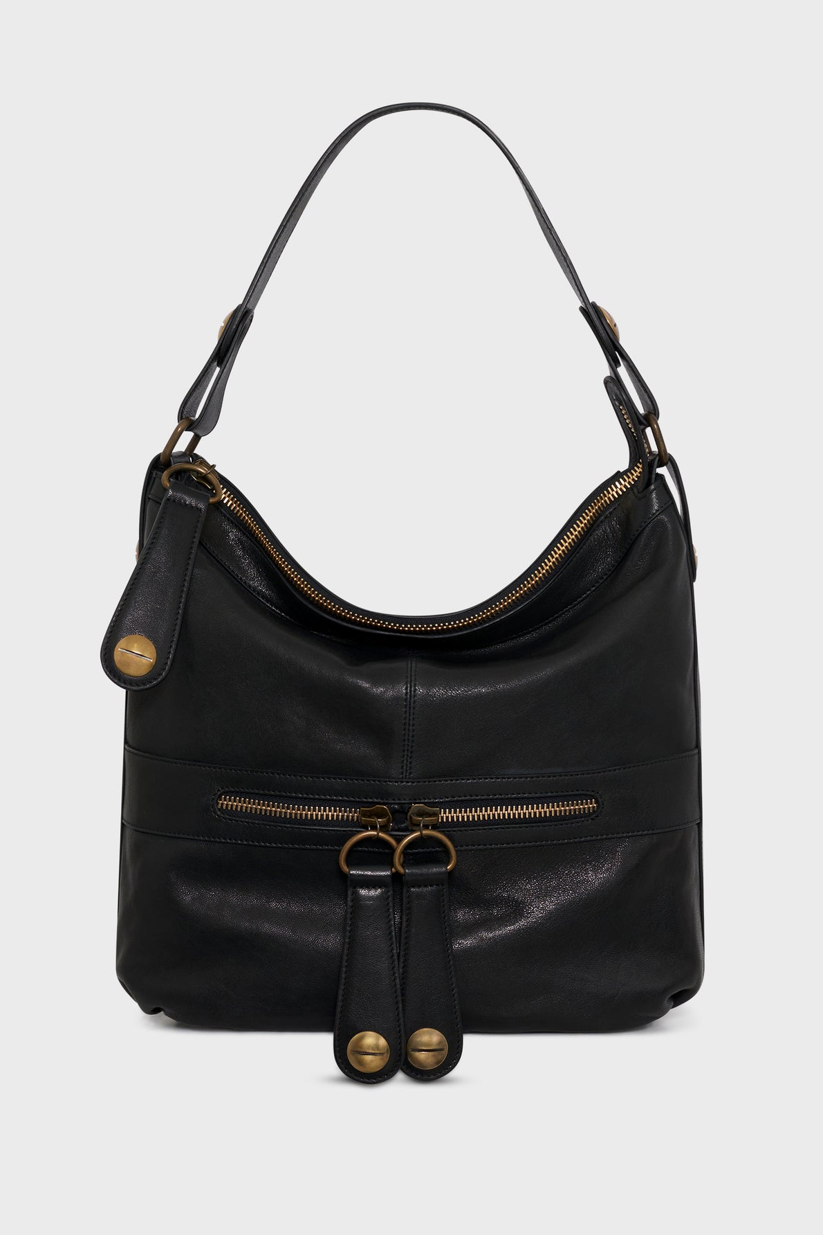 A black cuir de mouton sac hobo handbag with a curved top handle, gold zippers, front zip pocket, and two leather tassel pull tabs with gold metal accents, displayed on a plain light background.