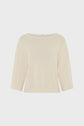 A cream-colored, three-quarter sleeve knit sweater with a boat neckline, displayed on a plain white background.