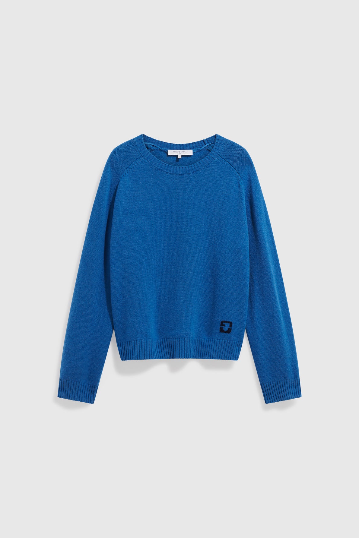 Bright blue knit sweater with long sleeves, ribbed cuffs and hem, a classic col rond neckline, and a small black square Esprit logo on the lower front left side, displayed on a plain white background. This pull laine offers both style and comfort for any occasion.