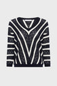 Black and white long-sleeve pull rayé sweater crafted from soft coton, featuring maille ajourée lace and solid knit stripes forming a V pattern on the front and horizontal stripes on the sleeves, displayed on a plain white background.
