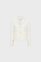 Cream-colored, textured womens blazer with long sleeves, two front pockets, a notched collar, and two gold buttons, displayed against a plain light gray background.