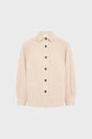 Beige button-up jacket with long sleeves, front collar, two large front pockets, and dark buttons, displayed against a plain white background—a perfect surchemise lin coton for those who want to look safari chic.