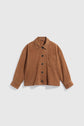 Brown suede button-up jacket with a collar, long sleeves, black buttons, and a single chest pocket, displayed on a plain white background. This veste en cuir velours combines timeless style with modern versatility, making it an ideal piece for layering as a veste surchemise.