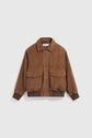 Brown suede bomber jacket with a collar, front zipper, two large front flap pockets, and ribbed cuffs and hem, displayed on a plain white background—a classic blouson cuir velours homme in an elegant taupe shade that effortlessly blends sophistication with casual style.