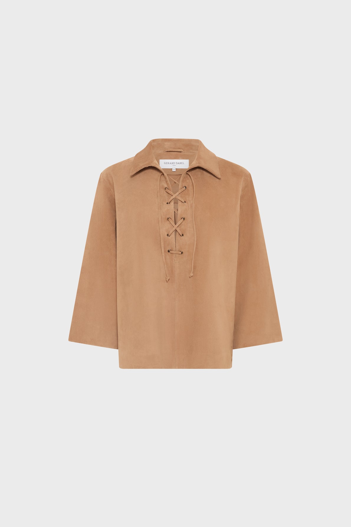 Tan suede long-sleeve top with a collar and lace-up front detail, displayed on a plain white background.