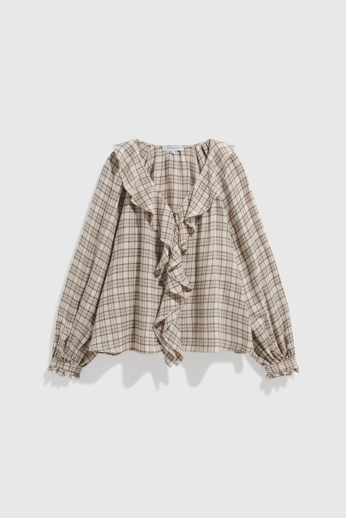 Displayed against a plain white background, this beige and brown plaid long-sleeve chemise à carreaux features a ruffled collar and front, as well as ruffled cuffs for a touch of elegance.